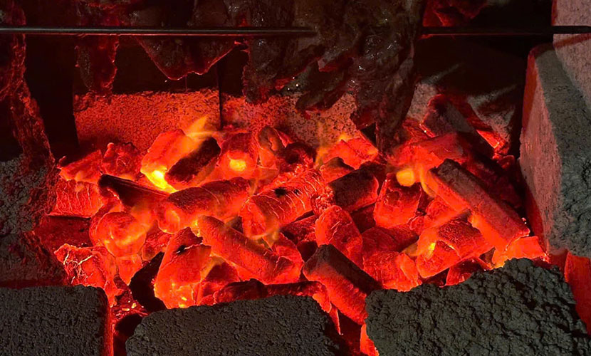 Vietnam's sawdust charcoal burning